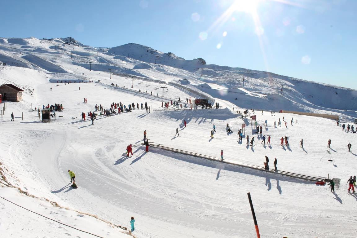 Skiers in the learners area at Cardrona