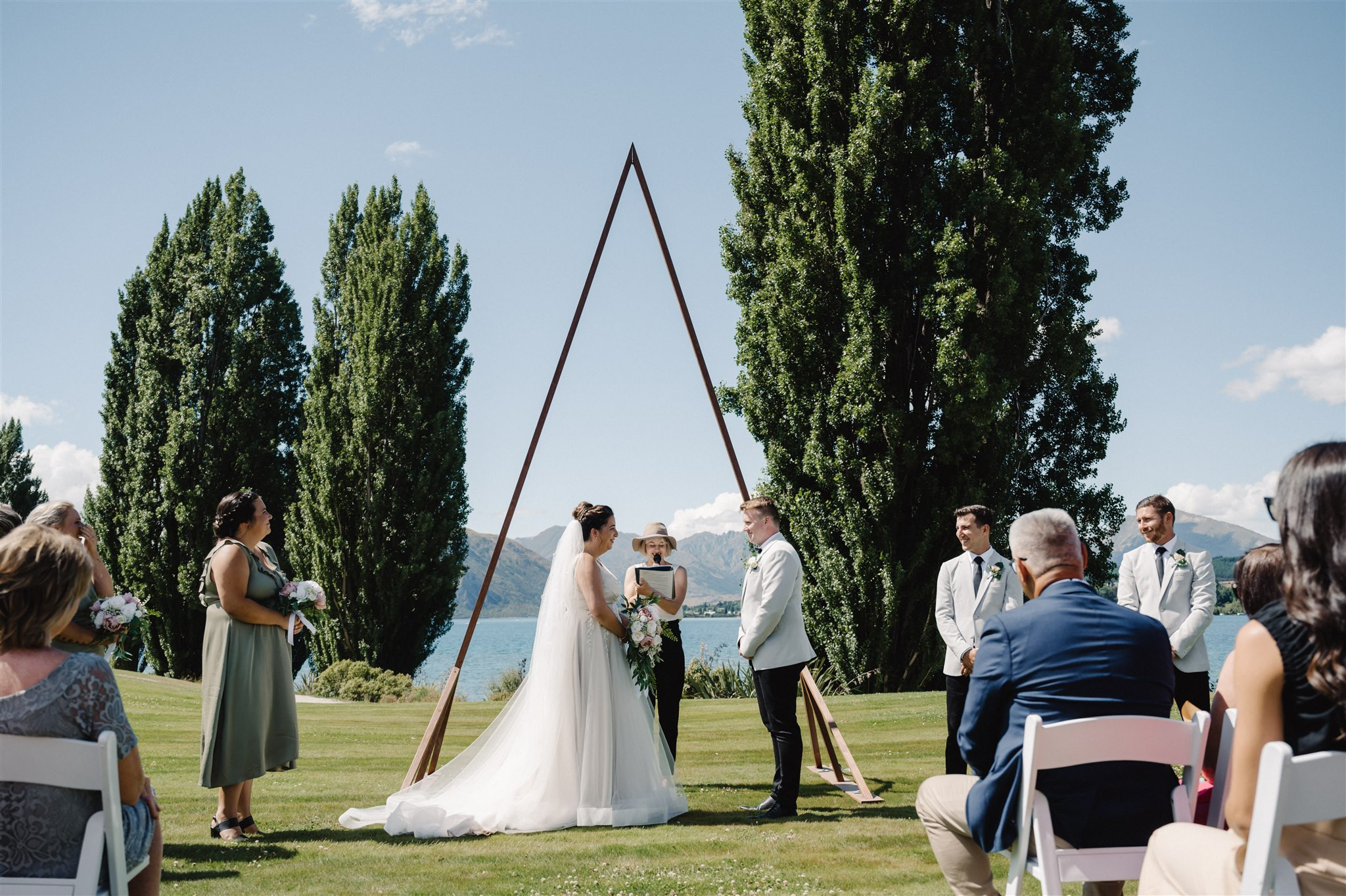 A stunning wedding on Edgewater's green lawns with Lake wanaka in the distance